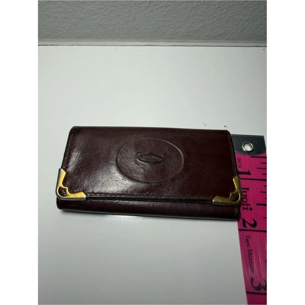 Cartier Brownish Red Leather Card Holder with Gold Corner Accents